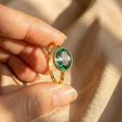 Stacked oval bezel gemstone rings with emerald quartz, minimalist gold stacking rings for women, modern everyday jewelry styling