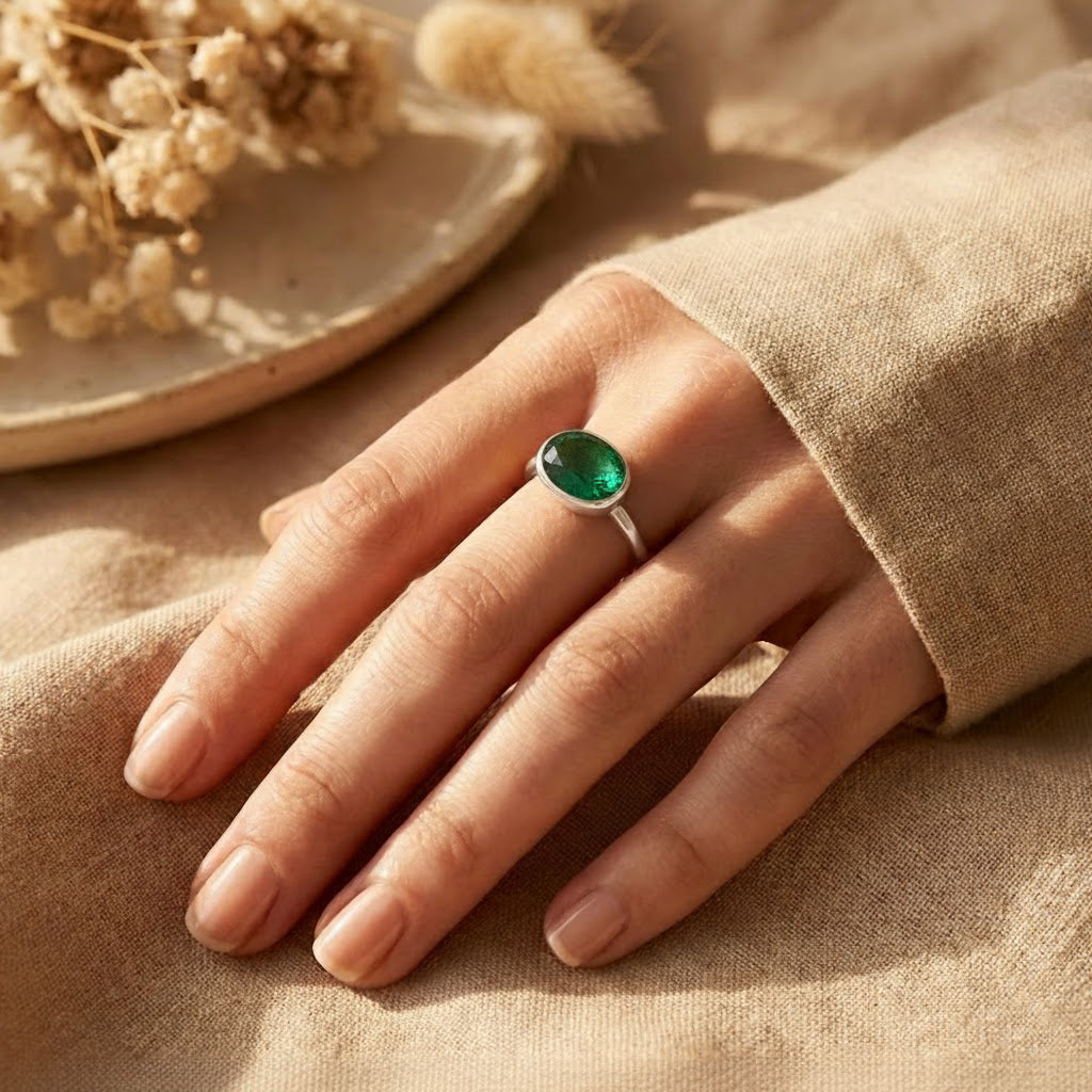 Emerald quartz oval ring worn on hand, dainty gold bezel set gemstone ring, minimalist green stone jewelry for daily wear