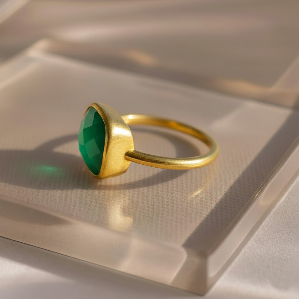 Side view of green onyx cushion cut ring highlighting bezel setting and polished band. Dainty gemstone ring handcrafted with a minimalist silhouette, perfect as a May birthstone ring or everyday gold jewelry.