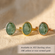 Rough green tourmaline rings displayed in sterling silver, yellow gold vermeil, and rose gold vermeil.
