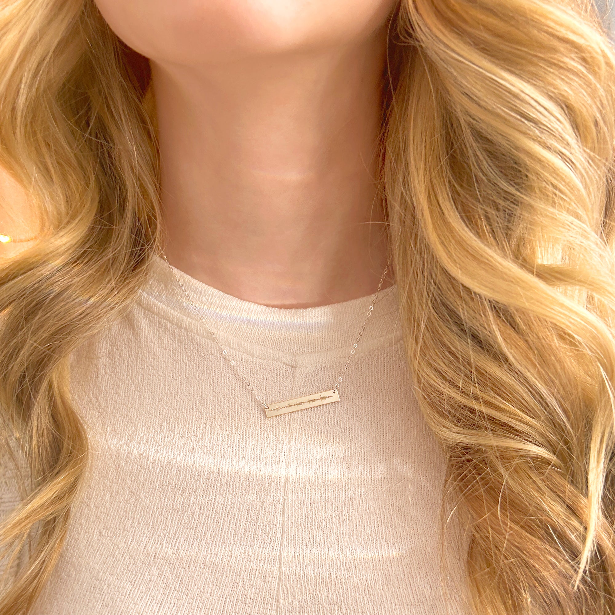 A person with blonde hair wears a sterling silver engraved sonogram bar necklace. Personalized minimalist necklace, custom sonogram necklace for new mom, stillborn baby memorial keepsake jewelry for mom, lost baby grief gift for mother, personalized new mom gift with sonogram, gold filled or sterling silver jewelry for new moms