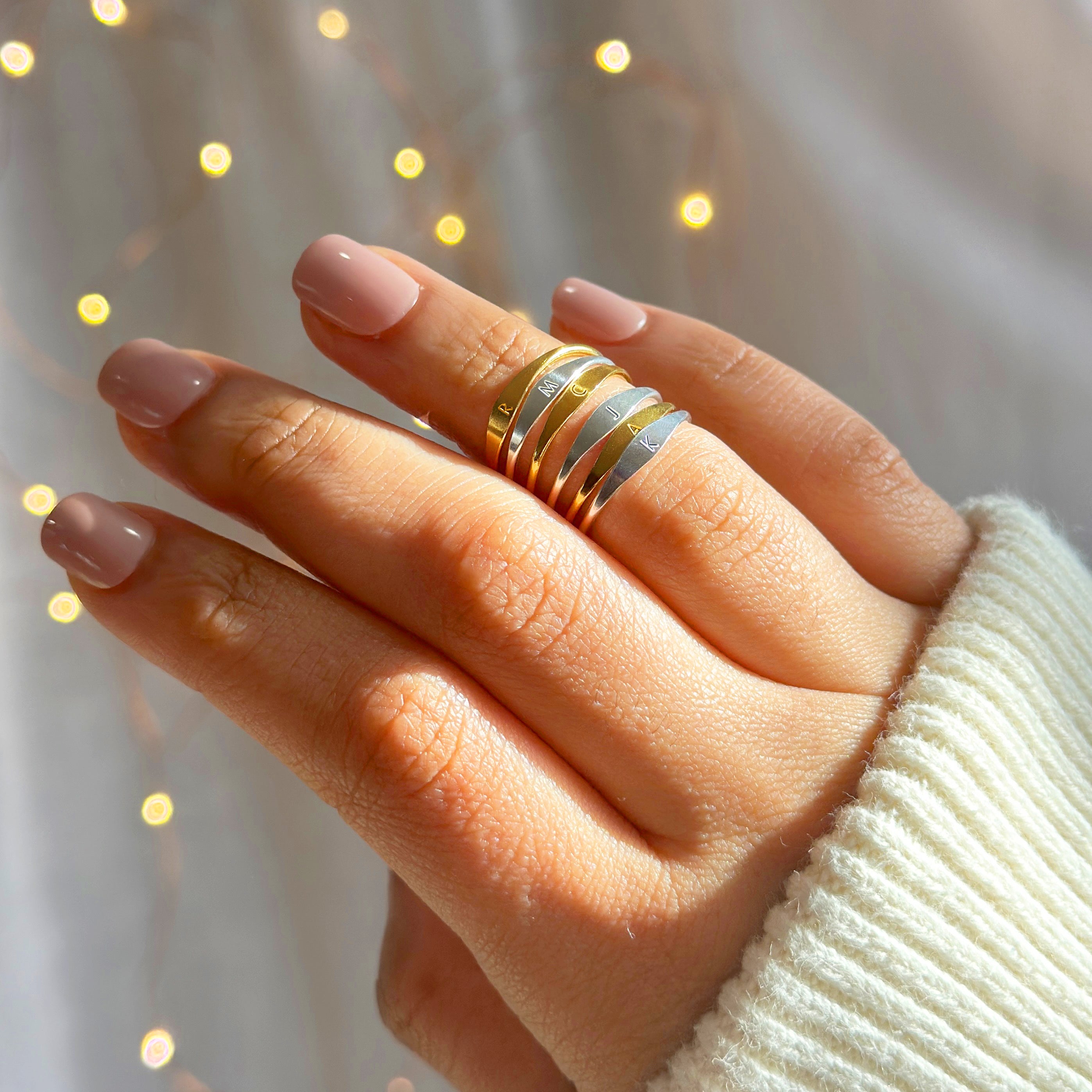 initial-rings-on-hand1_1.jpg