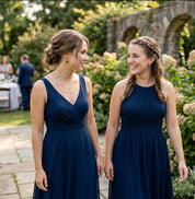 Bridesmaids wearing matching blue kyanite earrings, September birthstone wedding jewelry and bridesmaid gift idea