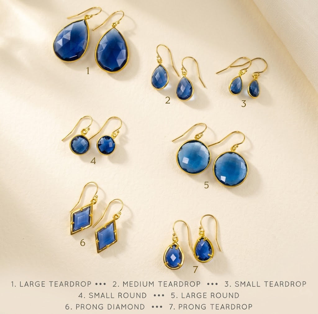 Blue kyanite earring size chart with teardrop, round, oval, and geometric gemstone styles in gold and silver