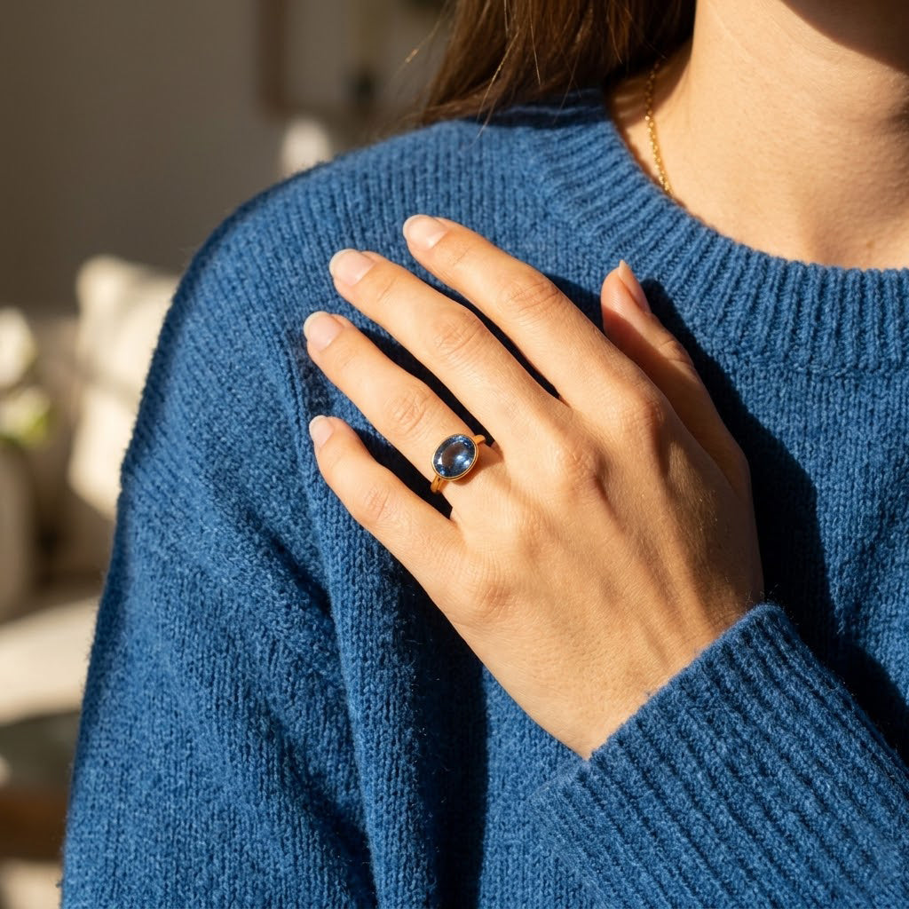 Rose Gold vermeil oval kyanite ring with deep blue faceted gemstone; classic bezel-set design, slim band, and high polish; timeless September birthstone ring for everyday elegance, promise ring style, or thoughtful gift for her.