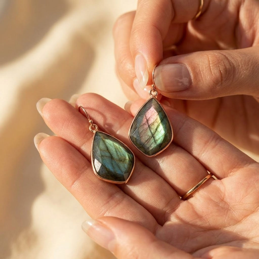 Blue labradorite gemstone earrings dainty drop earrings for women in close up shot
