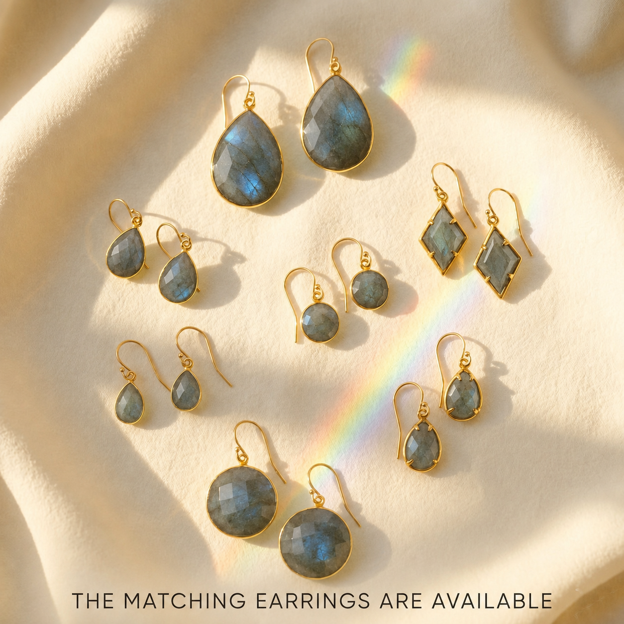 Matching labradorite earrings in round, teardrop, prong-set, and geometric shapes.