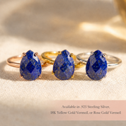 Lapis lazuli teardrop ring shown in gold, silver, and rose gold settings with natural blue gemstone options.