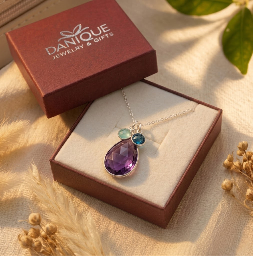 Mom birthstone necklace in sterling silver, yellow gold, and rose gold with teardrop stones