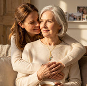 Mother hugging grandmother wearing a personalized birthstone necklace, meaningful family jewelry gift for grandma, elegant custom gemstone necklace lifestyle photo