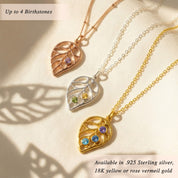 Custom leaf birthstone necklace available in sterling silver, yellow gold, and rose gold finishes with up to four stones.