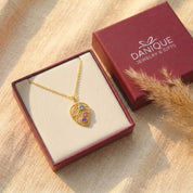 Personalized birthstone leaf necklace displayed in a Danique Jewelry gift box, ready for Mother’s Day or birthday gifting.