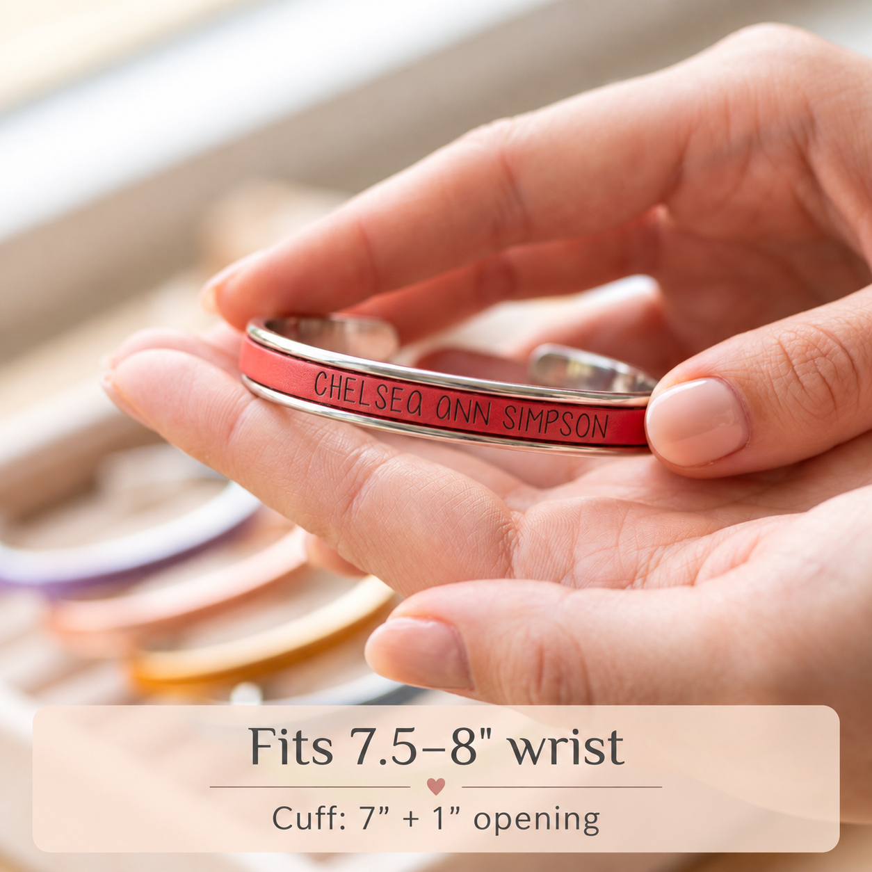 Personalized red leather cuff bracelet showing adjustable wrist fit
