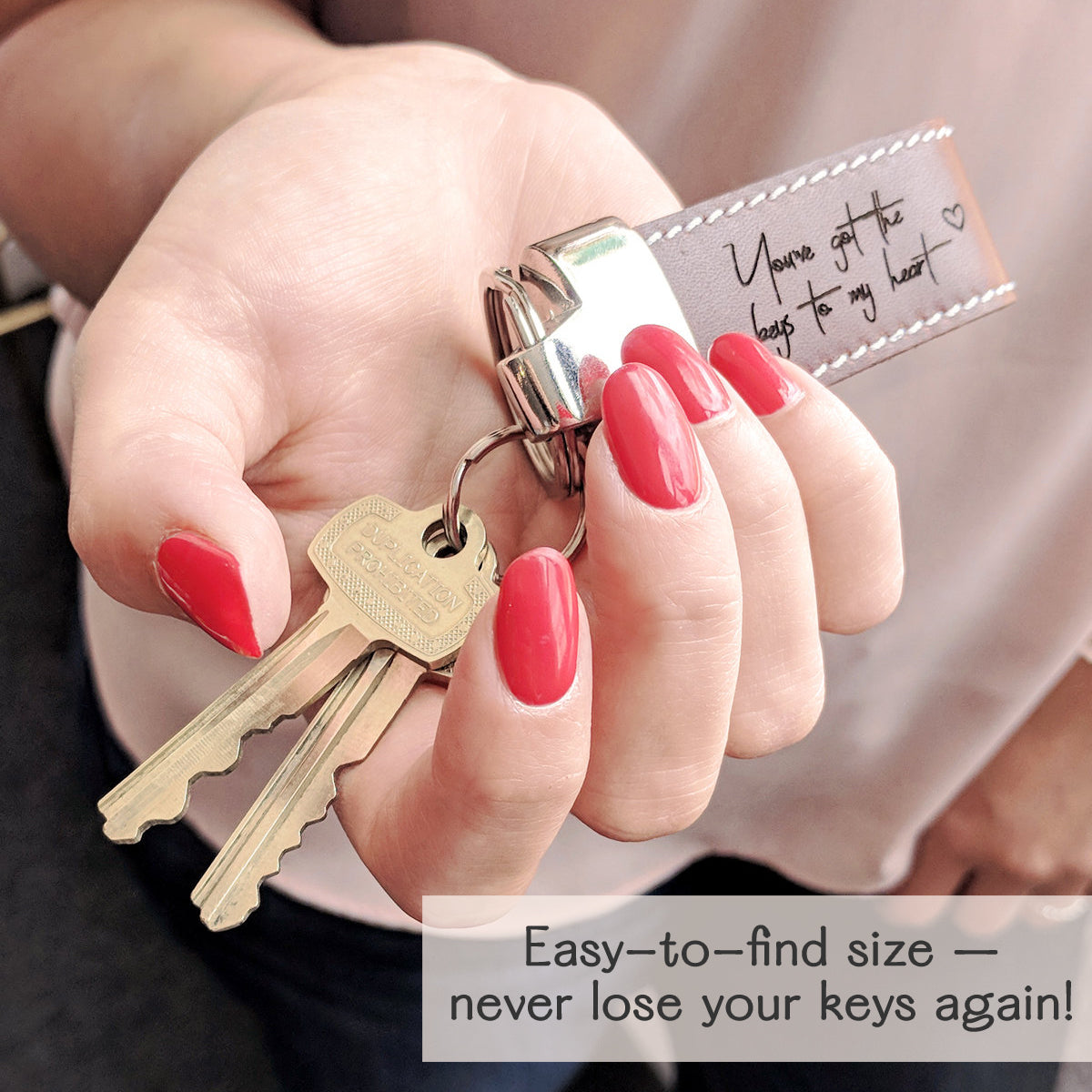 A person with a tan shirt holds a keychain that says You've Got the Keys to My Heart. Personalized Leather Loop Keychain Holding Keys Key Fob with Engraved Design, Custom Keychain, Coordinates keychain, custom location key fob, GPS coordinates engraved keychain, leather anniversary gift, leather wedding anniversary gift, 3rd anniversary gift, gift for him, gift for her, birthday gift, christmas gift, valentine's day gift, gift for mom, gift for dad, gift for grandma, medical ID keychain, gift for grandpa