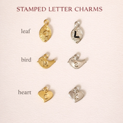 Stamped letter charm options for custom birthstone bracelet, personalized initial charms in gold and silver