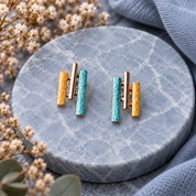 Sunray geometric stud earrings with turquoise gold silver and rose gold textured bars
