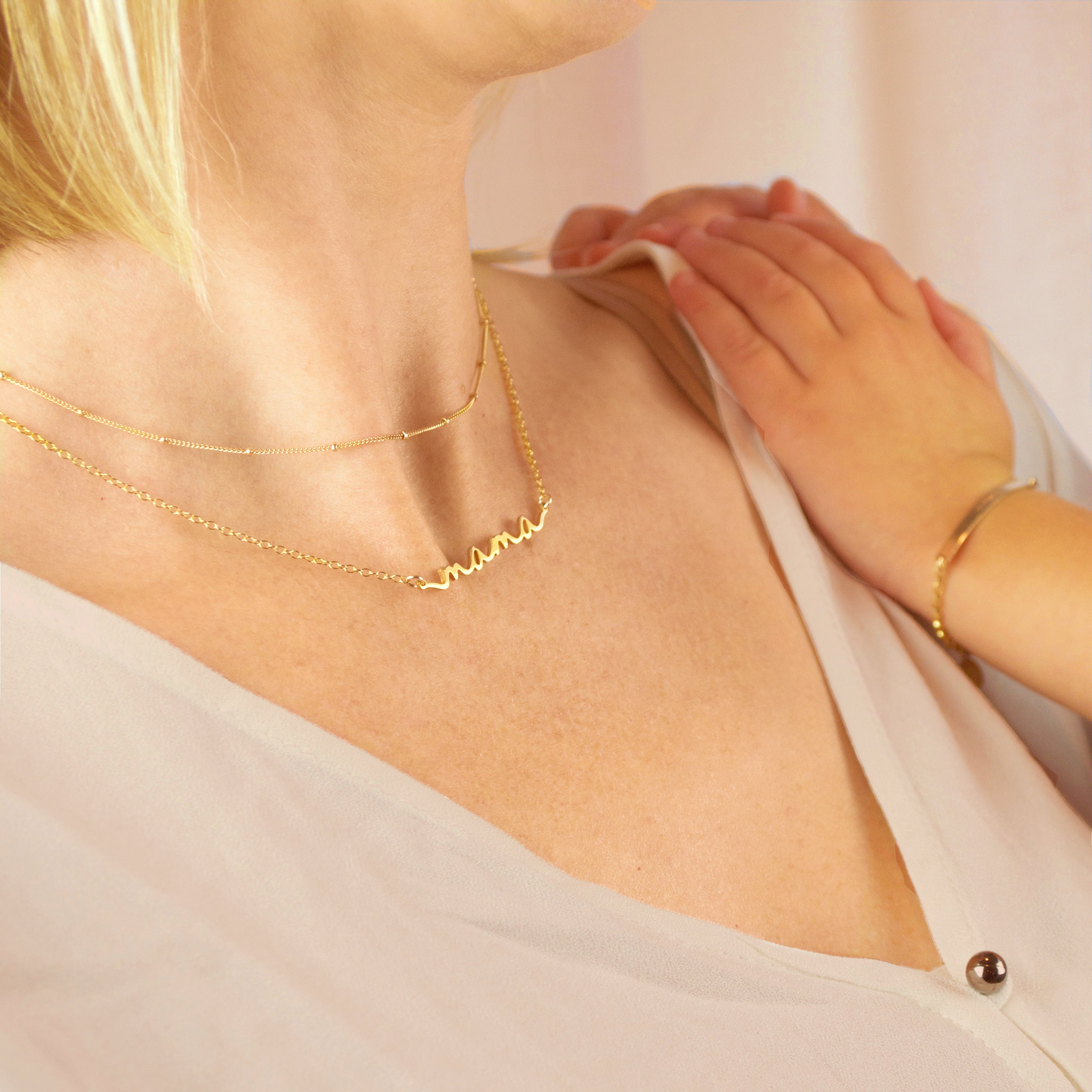 mama-necklace-baby-darker_29707b05-7a4a-4e95-8c7b-4e6fe48a066f.jpg