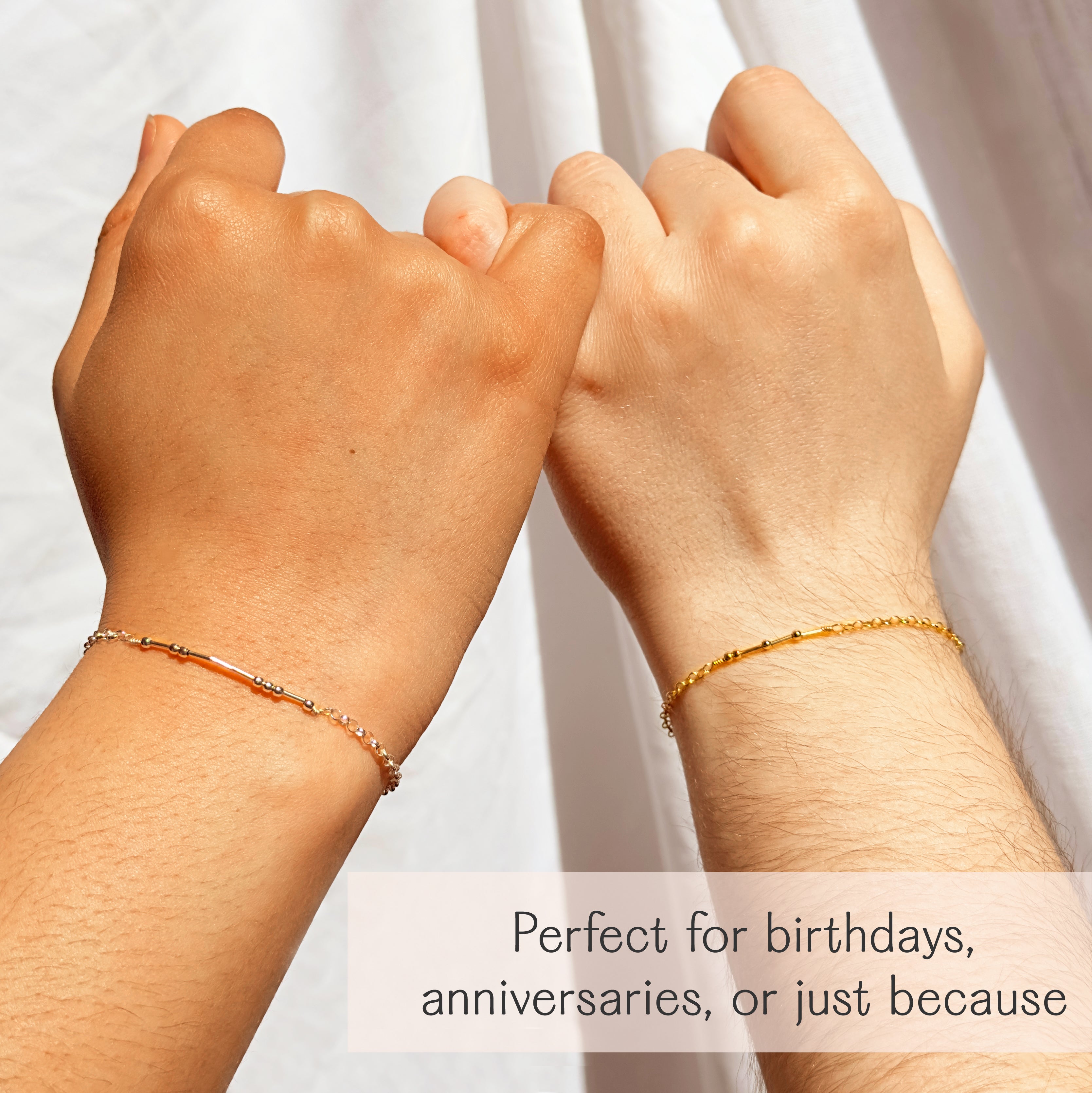 Matching Morse code bracelets on two wrists, symbolizing friendship, love, or connection. Perfect hidden message bracelet gift for couples, best friends, girlfriends, or boyfriends. Adjustable and dainty, available in sterling silver, gold filled, or rose gold filled. A thoughtful jewelry gift for birthdays, anniversaries, Christmas, Valentine’s Day, or long distance relationships.
