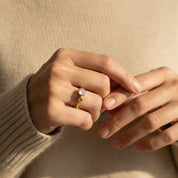 minimalist mother child birthstone ring worn on hand personalized gemstone ring for mom delicate stacking birthstone jewelry