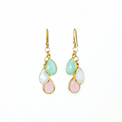 This drop earring design features tiny pear-shaped birthstones that cascade down to form a unique family birthstone style earring set. Pair in gold with 3 tiny teardrop stones in aqua chalcedony, moonstone, and pink chalcedony