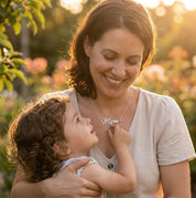 Mother and child lifestyle photo showing a personalized Mom birthstone necklace as a sentimental gift for mom.