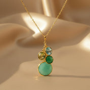 Custom mother’s birthstone necklace with gold chain and multiple bezel-set gemstones, including Aquamarine (March), Peridot (August), and Turquoise (December). Personalized family necklace for moms, grandmothers, or new mothers, available in sterling silver, gold filled, or rose gold filled. A meaningful jewelry gift for birthdays, Christmas, anniversaries, or Mother’s Day.