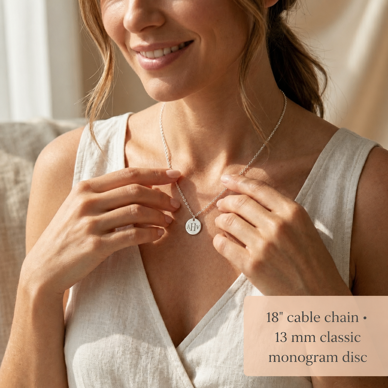 Woman wearing a personalized monogram necklace in a soft lifestyle photo, styled as an elegant custom initial pendant.