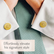 A man in a white dress shirt wearing monogrammed gold round cuff links. mens anniversary gifts, gifts for men, christmas gifts for him, valentine's day gifts for men, gift for husband, gift for fiance, father's day gift, birthday gift, wedding anniversary gift, wedding party gift, father of the groom gift, father of the bride gift, gift for grandfather, gift for grandpa, groomsman gift, groomsmen gift