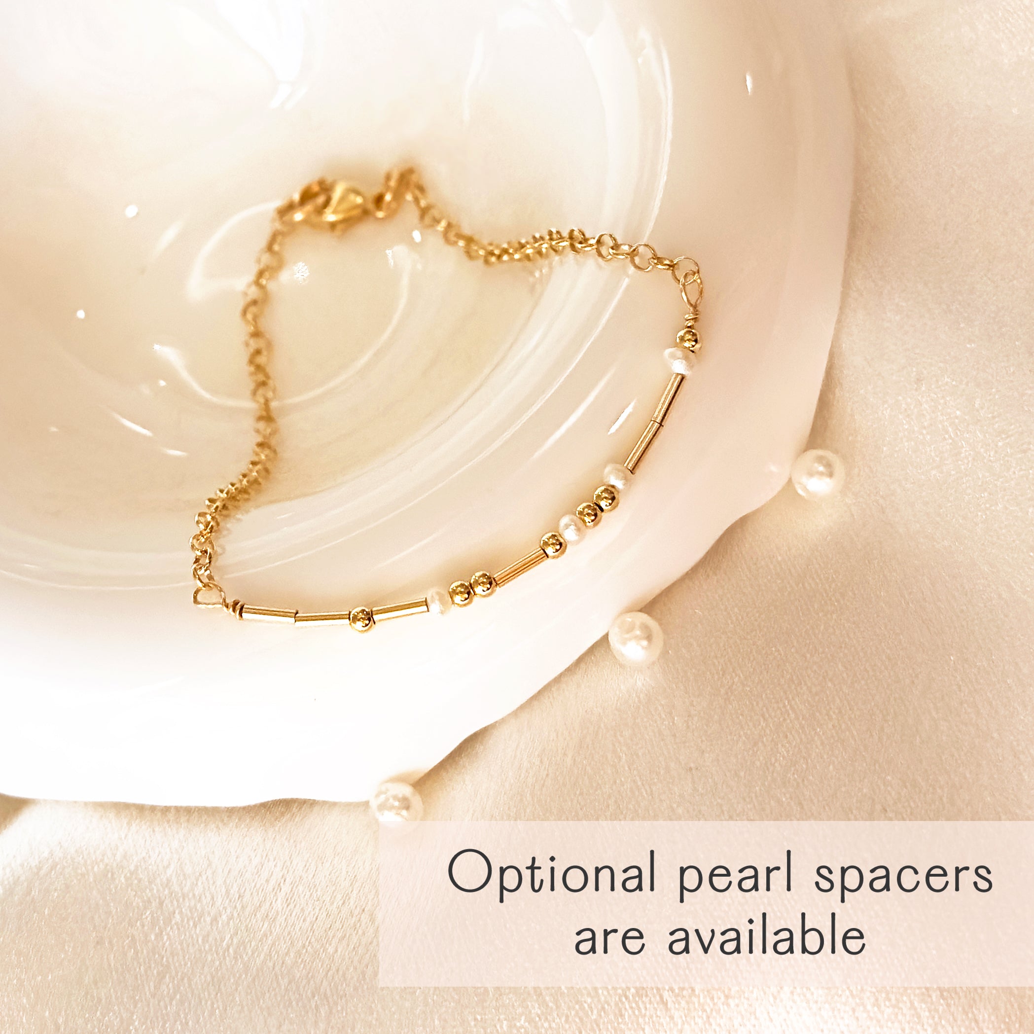 Gold morse code bead bracelet with pearl spacers. delicate bracelets, gold and silver, with small beads spaced evenly along the length of each bracelet. Pinky promise. Morse code bead jewelry, morse code beaded jewelry, secret message jewelry, bff jewelry, bff bracelet, pinky promise bracelet, secret message bracelet, hidden message jewelry, hidden message bracelet, sterling silver, gold, adjustable bracelets, delicate bead bracelet, new product, delicate pattern of dots and dashes bracelet