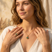 close up of cushion gemstone pendant necklace on neckline, delicate and modern jewelry styling