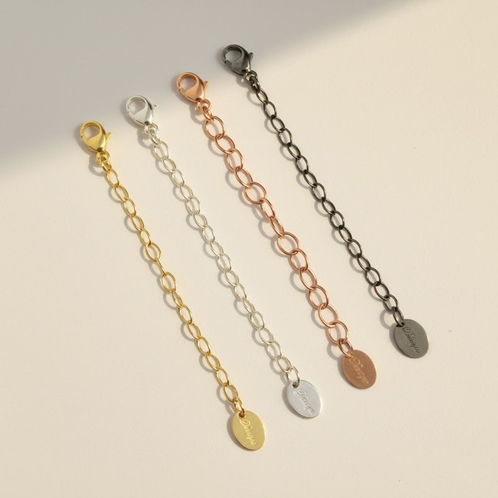 Set of necklace extenders in gold, silver, and rose gold with lobster clasps, ideal for layering or adjusting necklace length. Adjustable chain extension adds versatility to jewelry collection, ensuring a comfortable fit for every outfit. Jewelry accessory gift idea for birthdays, bridesmaids, or everyday wear.