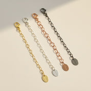Set of necklace extenders in gold, silver, and rose gold with lobster clasps, ideal for layering or adjusting necklace length. Adjustable chain extension adds versatility to jewelry collection, ensuring a comfortable fit for every outfit. Jewelry accessory gift idea for birthdays, bridesmaids, or everyday wear.