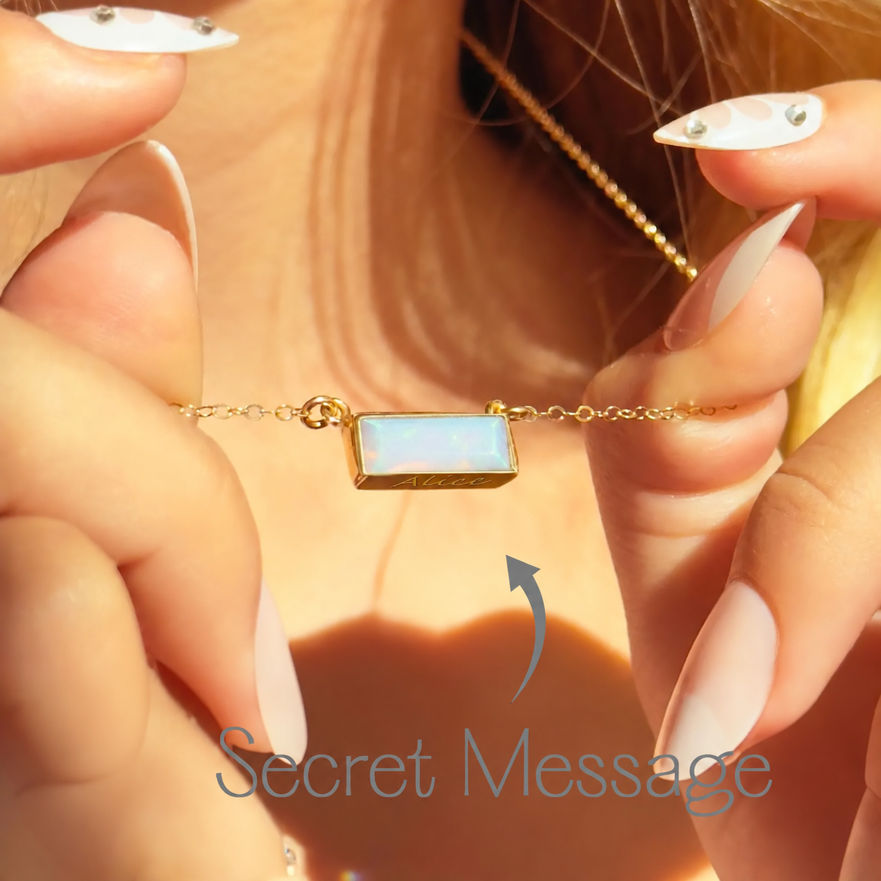 Personalized horizontal Opalite bar necklace with hidden secret message engraving in yellow gold.
