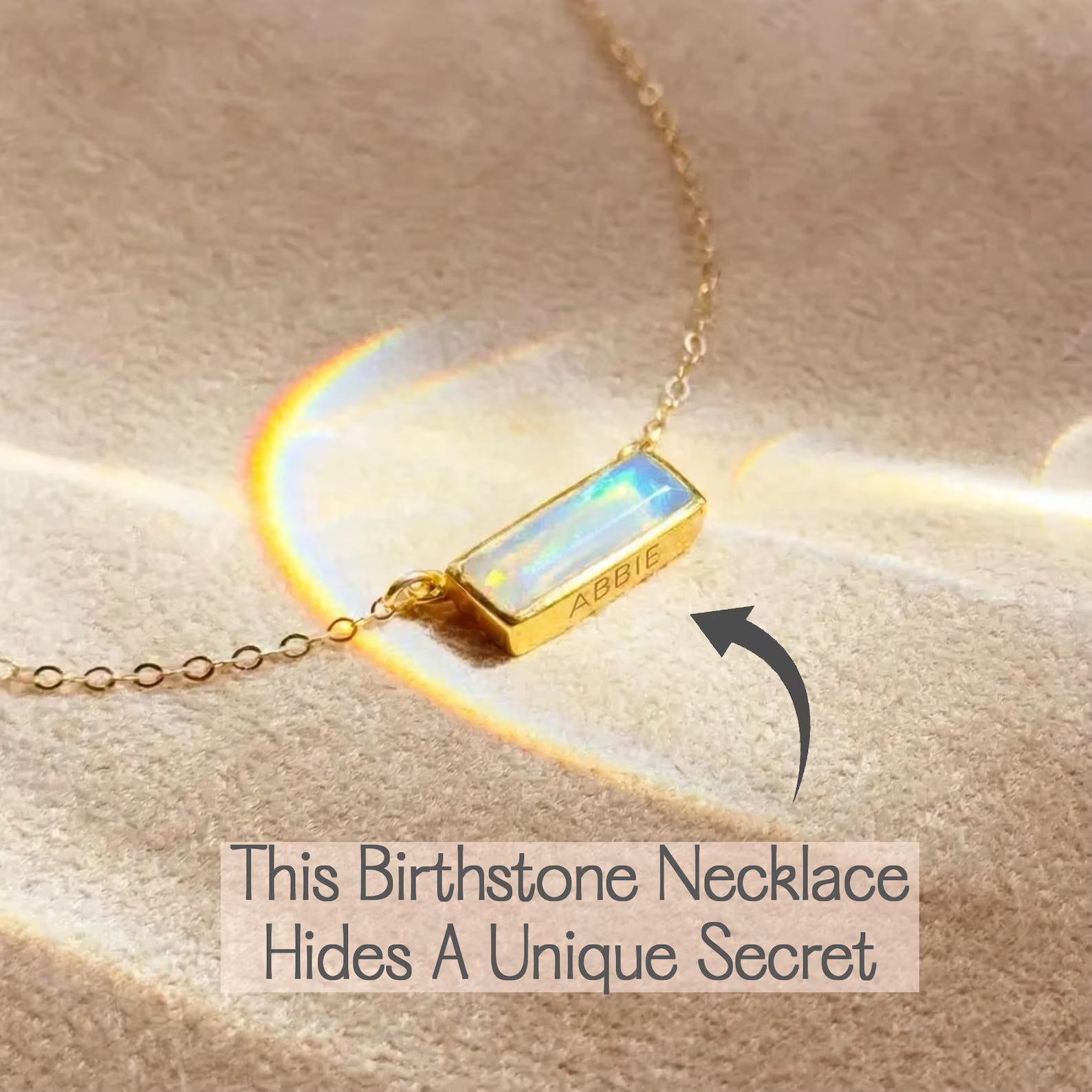 Opalite horizontal bar necklace in yellow gold shown as an October birthstone alternative.