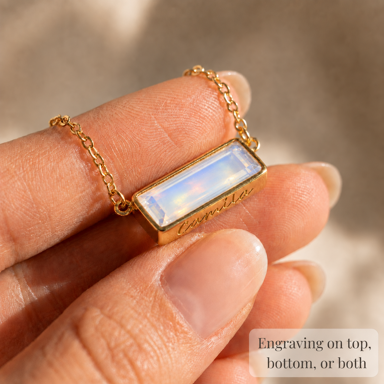 Close-up of horizontal Opalite baguette necklace showing hidden engraving available on the top, bottom, or both edges.