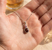 Personalized two birthstone necklace shown on a model, featuring a delicate pendant design for moms, bridesmaids, sisters, or best friends.