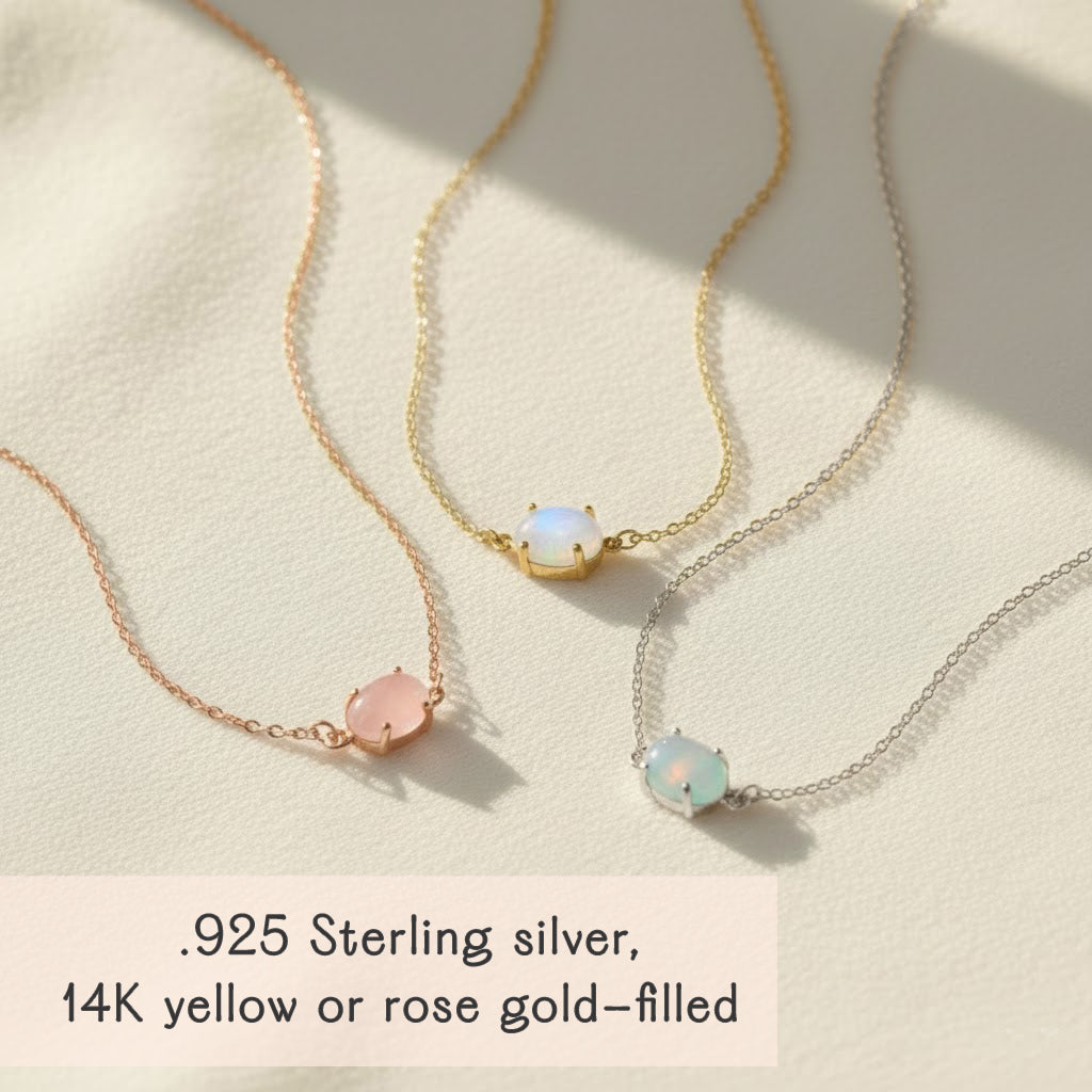 Three horizontal oval birthstone necklaces shown in gold, rose gold, and silver finishes with customizable oval gemstones such as emerald quartz, pink tourmaline, moonstone, and blue topaz. Personalizable with child name engraving on the back, this multi-stone family necklace makes a beautiful Christmas gift for mom, grandma, or new mothers looking for elegant custom birthstone jewelry that celebrates children and loved ones.