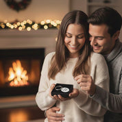 Lifestyle scene of a couple exchanging a personalized engraved keychain featuring custom handwriting or signature engraving on a polished oval stainless steel tag. Perfect sentimental gift for anniversaries, Christmas, Valentine’s Day, Father’s Day, or Mother’s Day. Customizable with handwriting, monograms, text, photos, fingerprints, or kids’ drawings. High-quality keepsake ideal for partners, parents, grandparents, or best friends, with optional engraving on one or both sides.