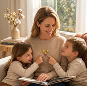 Mom wearing personalized birthstone name necklace with two children
