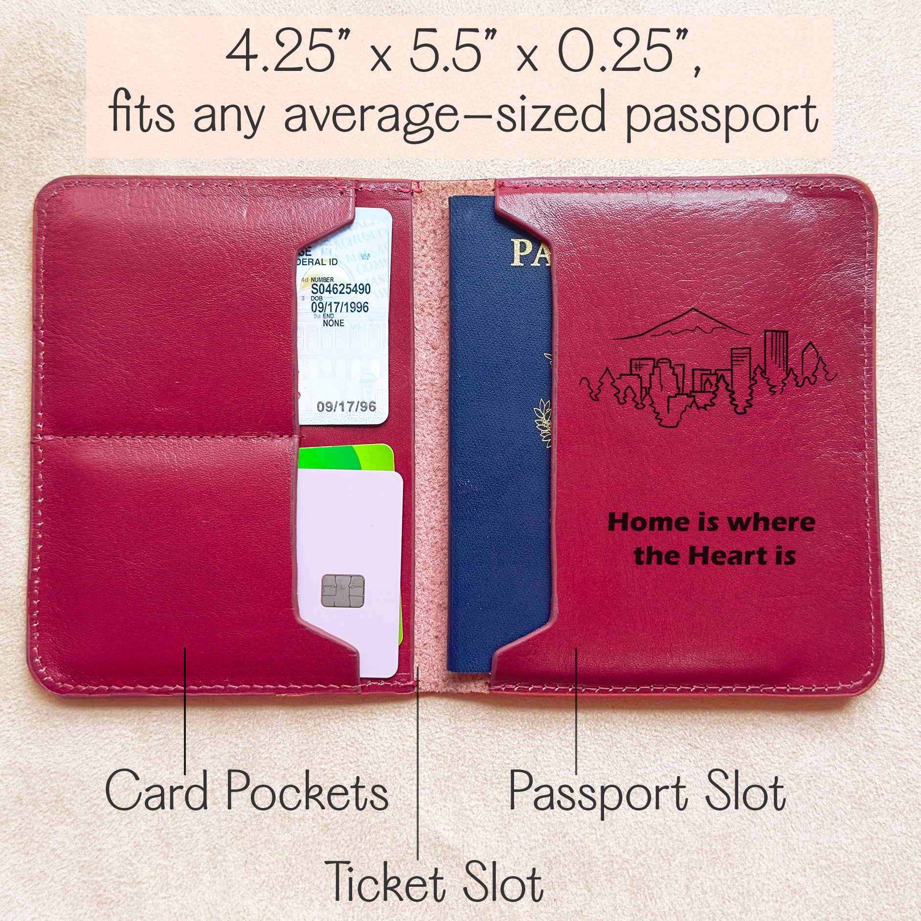 Open view of a red leather travel document holder featuring organized compartments including passport slot, ticket sleeve, and two card pockets. Size dimensions 4.25" x 5.5" x 0.25", compatible with most standard-sized passports. Stylish travel wallet engraved with a mountain skyline and the phrase “Home is where the Heart is.” Perfect for keeping travel essentials safe and accessible. Ideal jetsetter accessory, international travel organizer, boarding pass holder, and compact ID and credit card carrier.