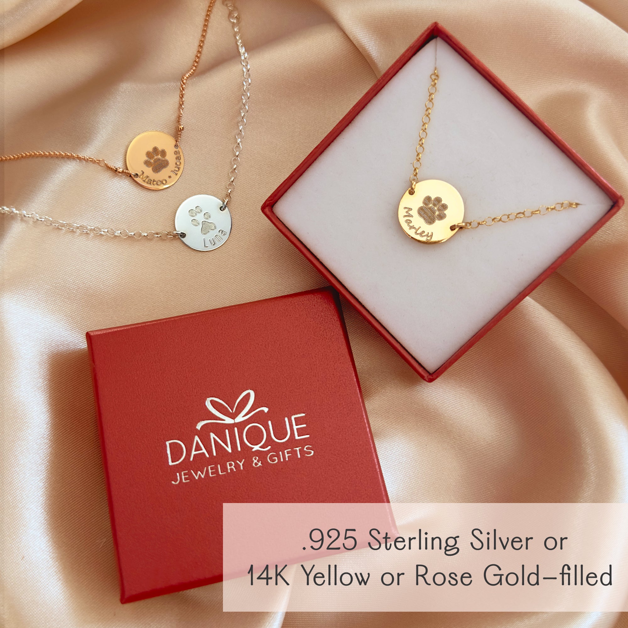 Three engraved paw print bracelets shown in Danique Jewelry gift boxes, personalized pet memorial keepsakes available in silver, gold, and rose gold finishes. Great gift for Dog or Cat Adoption.