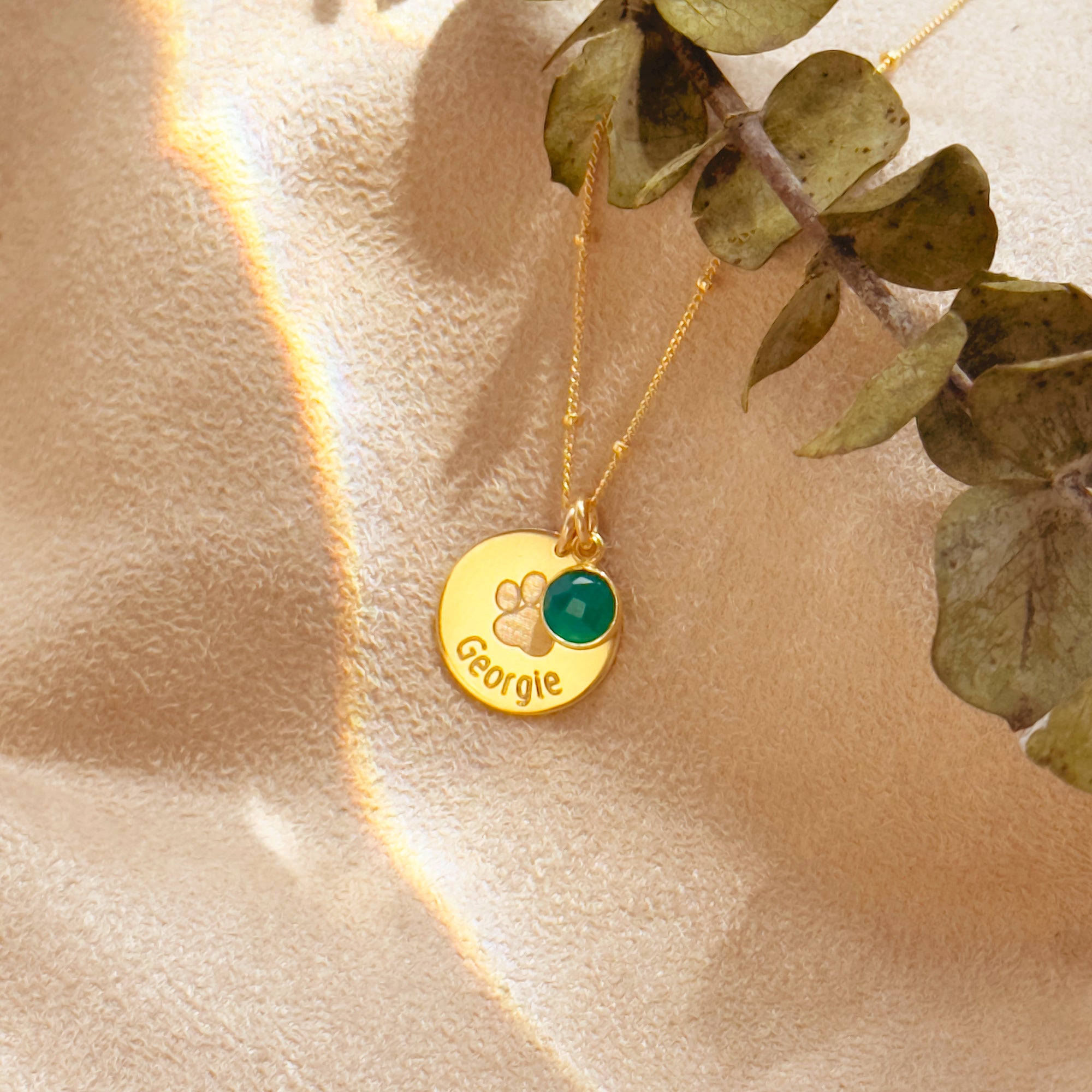 paw-print-disc-necklace-gold.jpg