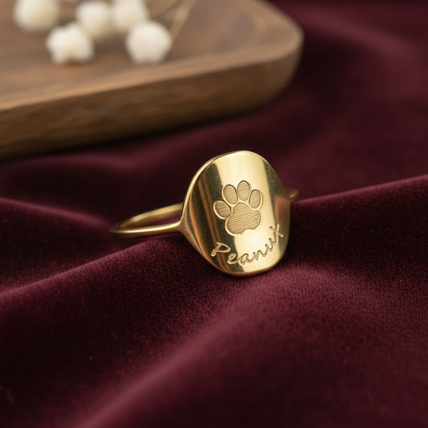 Custom engraved paw print gold plated ring with name peanut. Great gift for dog mom or dog dad for gotcha day, birthday or anniversary.