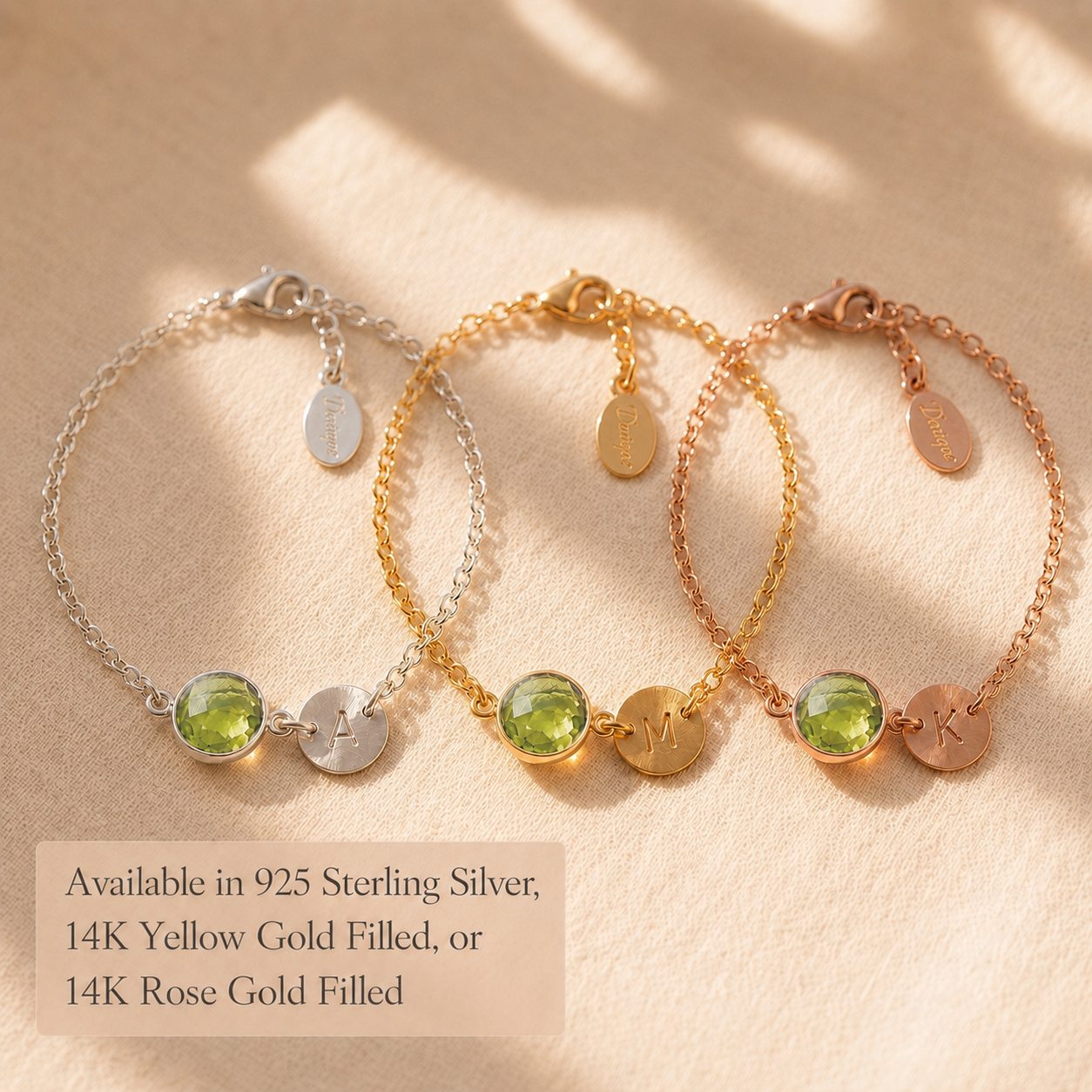 Peridot initial bracelets in sterling silver, yellow gold filled, and rose gold filled finishes.