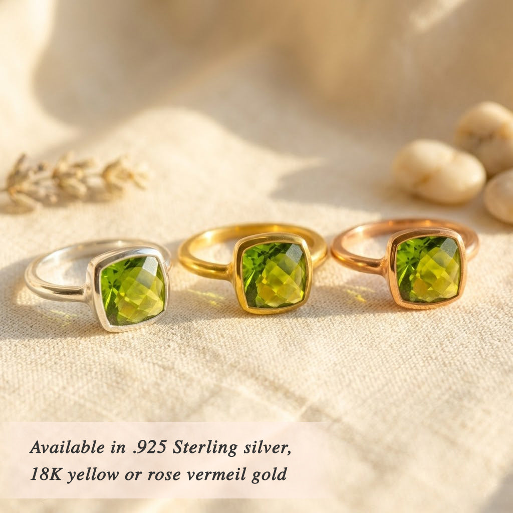 Peridot ring worn on model with natural light highlighting green gemstone