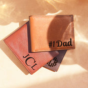 Personalized leather wallets with custom engraving, including monogram initials and #1 Dad design, handcrafted from natural leather in honey brown. This custom wallet for men makes a meaningful Father’s Day wallet, birthday gift for dad, or Christmas present. Engraved wallets for men with initials, handwriting, or coordinates are thoughtful personalized gifts for husband, boyfriend, or grandfather.