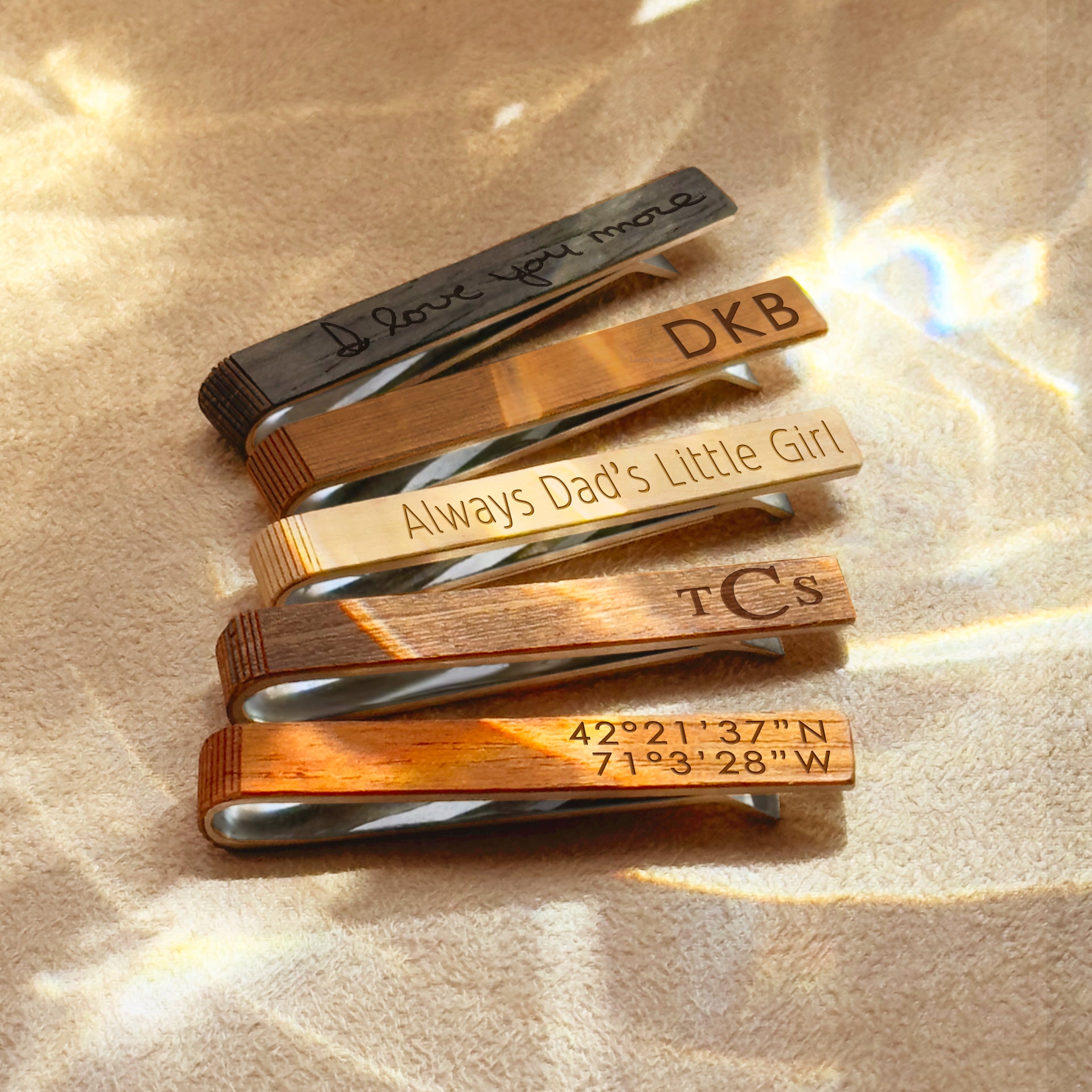 Set of custom wooden tie clips with engraving options on front, back, or both sides. Woods include mahogany, walnut, cedar, ebony, and afromosia. Perfect personalized gift for groom, groomsmen, best man, Father’s Day, 5th anniversary, graduation, or retirement. A timeless men’s accessory adding rustic elegance to weddings, business attire, and special occasions.