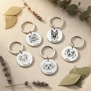 Collection of custom pet portrait keychains displayed together, featuring engraved dog and cat illustrations with names. Personalized round pet keychains crafted from stainless steel, designed as heartfelt keepsakes for pet parents. Ideal for memorial pet gifts, dog lover gifts, or meaningful personalized accessories.