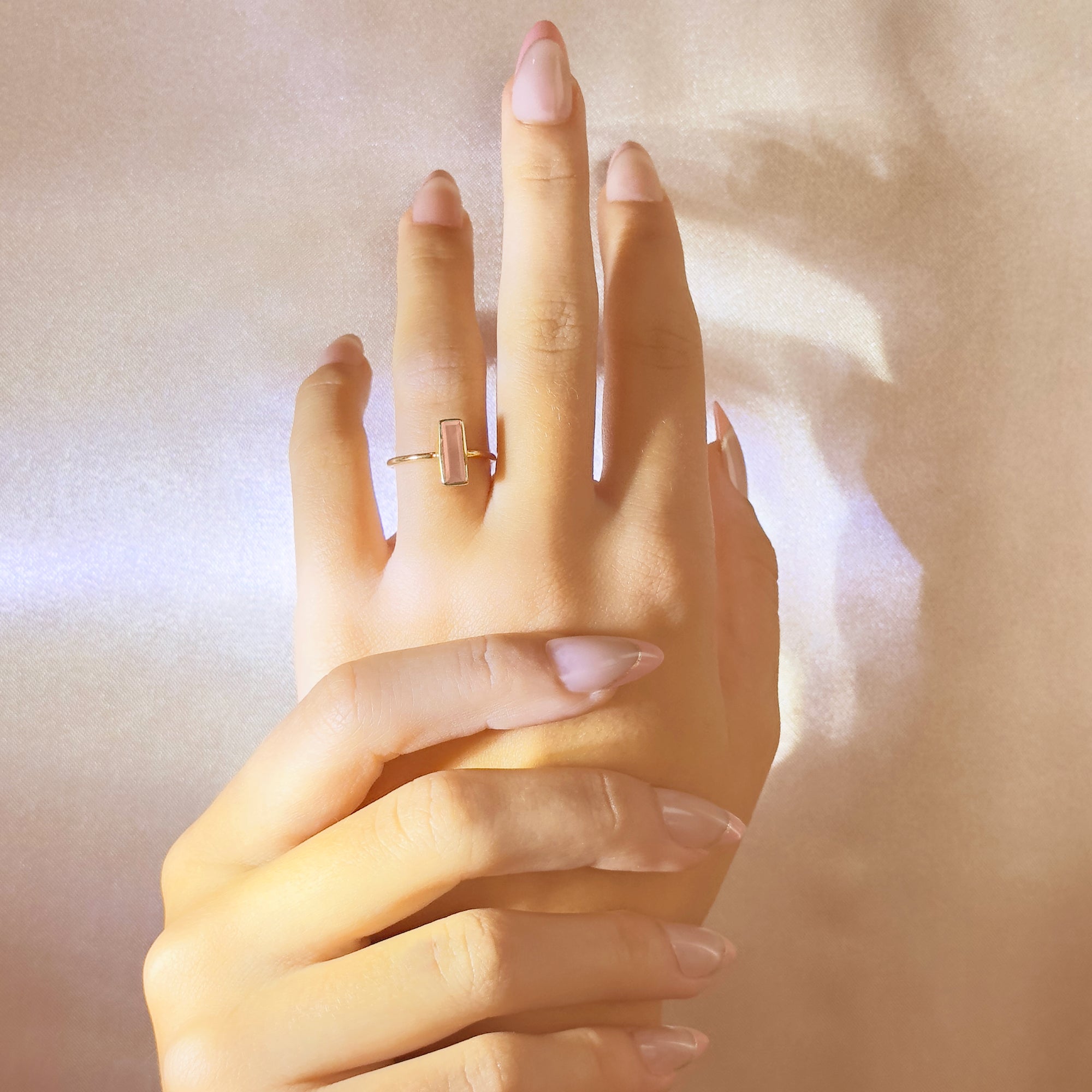 pink-chalcedony-october-small-baguette-adira-ring-model.jpg