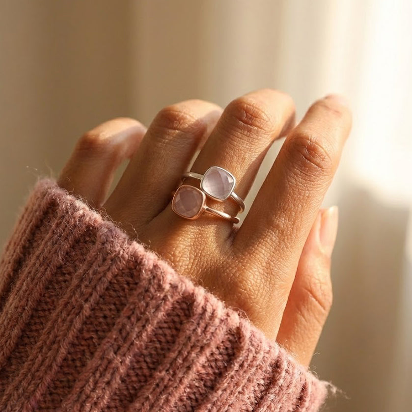 Minimalist pink chalcedony October birthstone ring worn on hand, soft pastel gemstone jewelry for everyday wear